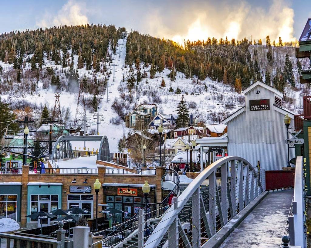 Winter view of Park City Main Street with the ski lift and mountain in the background